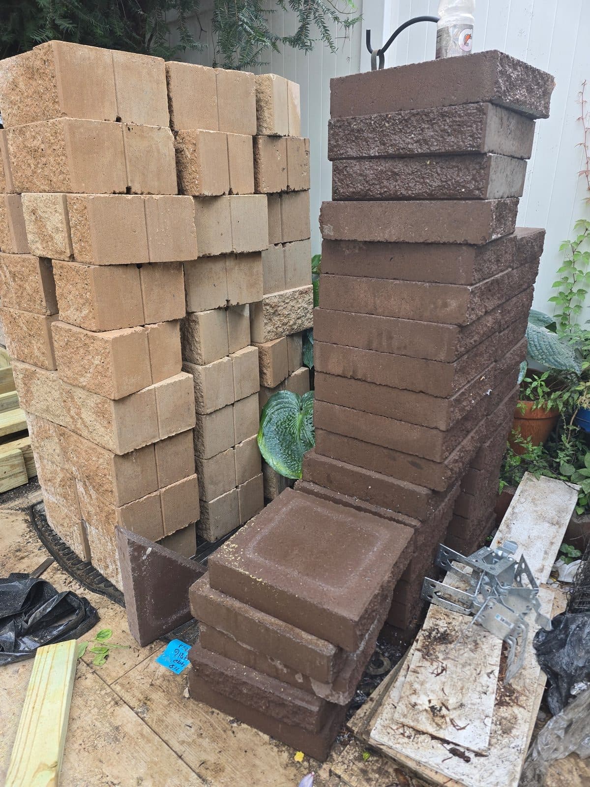 UNUSED decorative retaining wall brick and cap. Bricks never laid