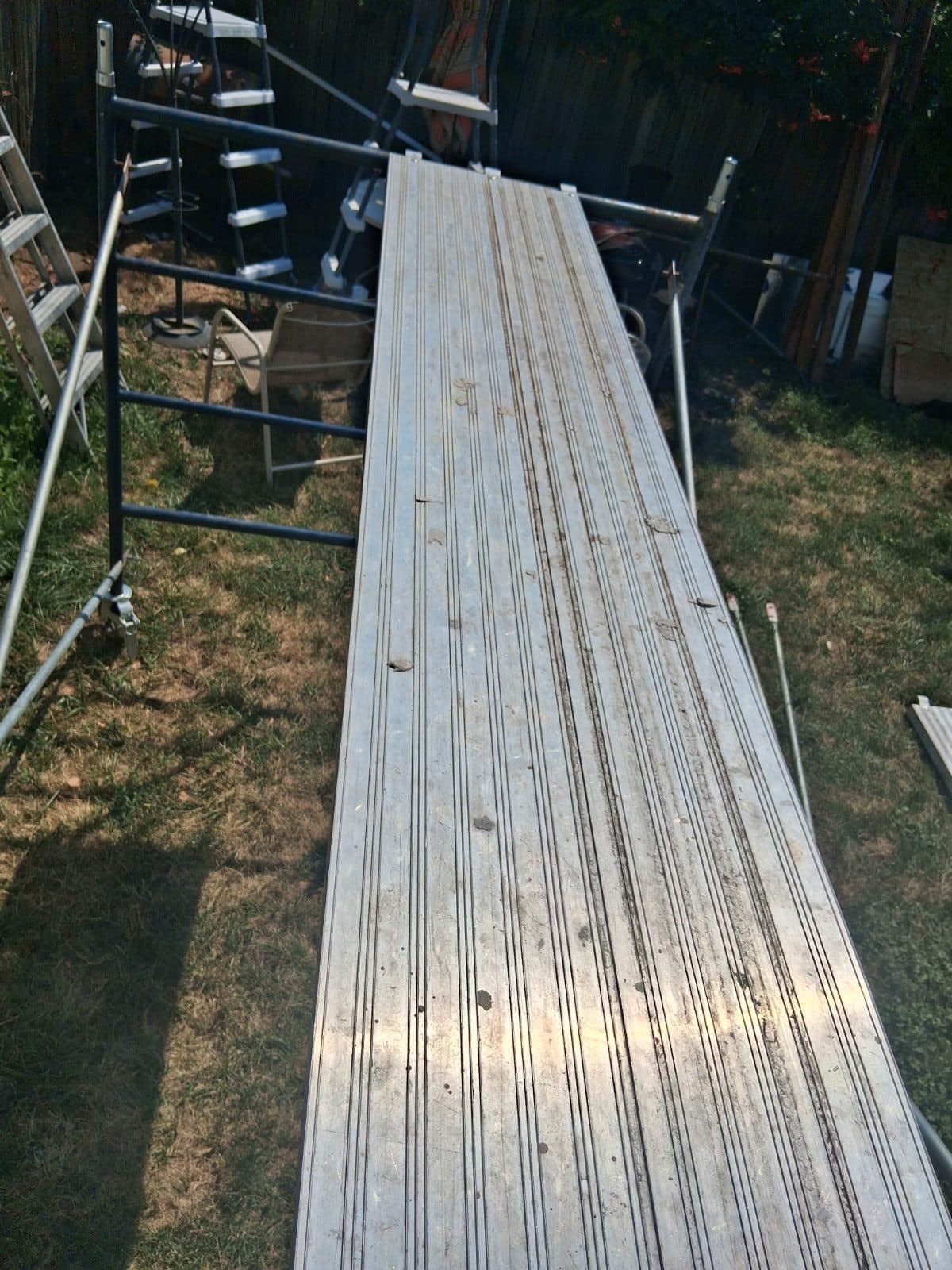 3 tiers of metaltech steel rolling scaffolding with 4 10ft.  Aluminum planks  2