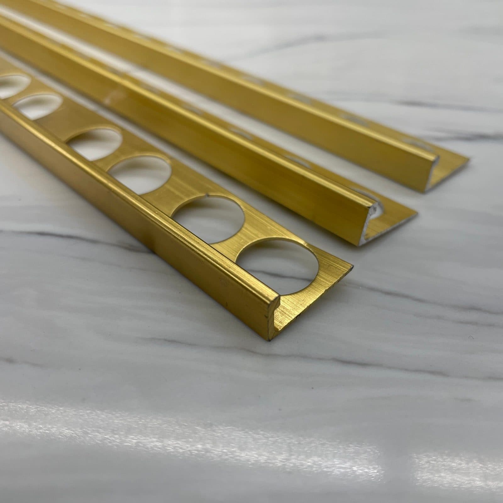 National Metal Shapes 10024 BR 5/16" Aluminum Trim Profile - Gold / Bright Brass