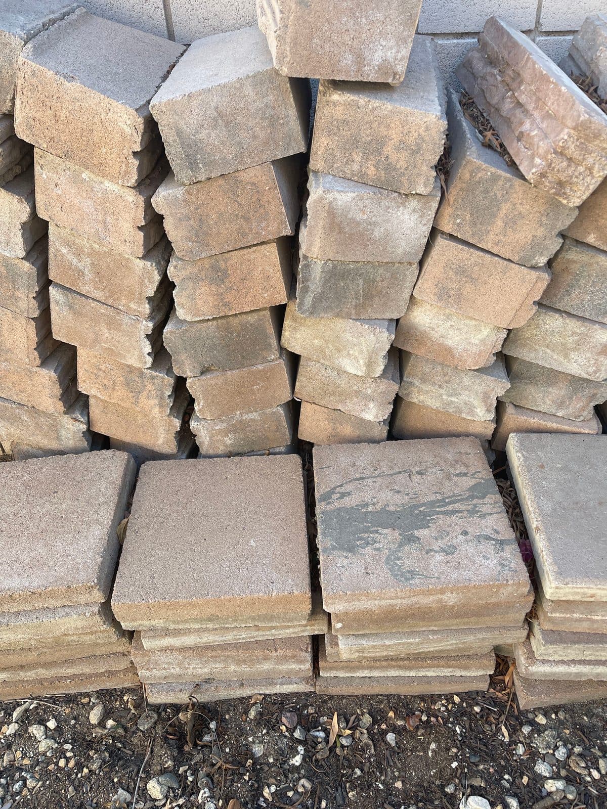 Square pavers (32).
Concrete edging (approximately 70)